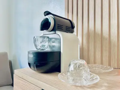 a blender sitting on a table with a glass at Apartment in rabat agdal in Rabat