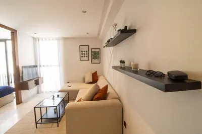 a living room with a couch and a table at Comfort & Premium in Casablanca