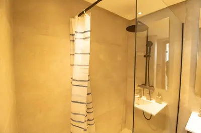 a bathroom with a shower with a shower curtain at Comfort & Premium in Casablanca