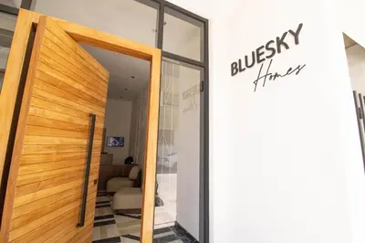 a glass door to a building with a sign on it at Comfort & Premium in Casablanca