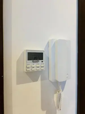 a phone on a wall next to a phone at Studio cosy in Casablanca