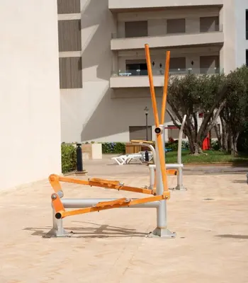 an orange object sitting in front of a building at Appartement 2 Chambres à Coté avec Grand Balcon, Piscine, Aire de Jeux pour Enfants et Jardin in Casablanca