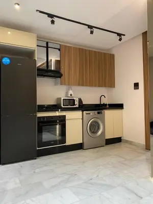 a kitchen with a washer and a stove and a dishwasher at VIVASTAY Casablanca - Cosy Maarif Arena 41 in Maarif