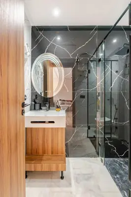 a bathroom with a sink and a shower at VIVASTAY Casablanca - Cosy Maarif Arena 41 in Maarif