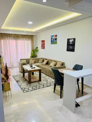 a living room with a couch and a table at Rafina in Casablanca
