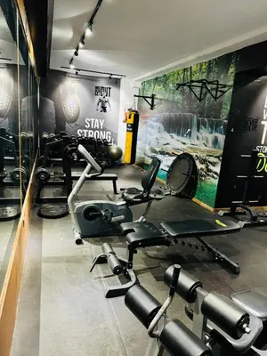a gym with several exercise bikes in a room at Rafina in Casablanca