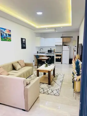 a living room with a couch and a table at Rafina in Casablanca