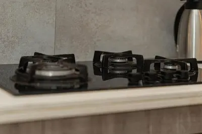 a stove top with four burners on a counter at Apartment Studio en Cœur de Casablanca ,Racine in Casablanca