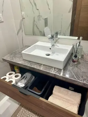 a bathroom counter with a sink and a mirror at Studio Adam 18 CFC 2 minutes away in Casablanca