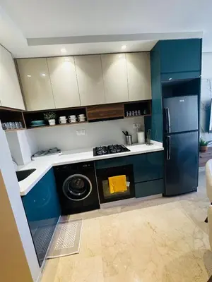 a kitchen with a stove and a refrigerator at Studio Adam 18 CFC 2 minutes away in Casablanca