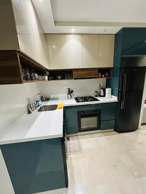 a kitchen with a sink and a refrigerator at Studio le César 6 CFC 2 minutes away in Casablanca