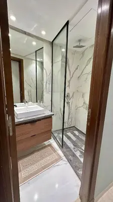 a bathroom with a tub and a sink and a shower at Studio le César 6 CFC 2 minutes away in Casablanca