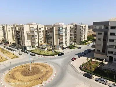an aerial view of a street in a city at Appart Haut Standing, Très Calm à Nouaceur, Parking, Piscine, à 4min de l'Aéroport in Casablanca