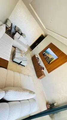 an overhead view of a living room with a white couch at CAN STADIUM VIEW Luxurious Place Prestigia Hay Riad in Rabat