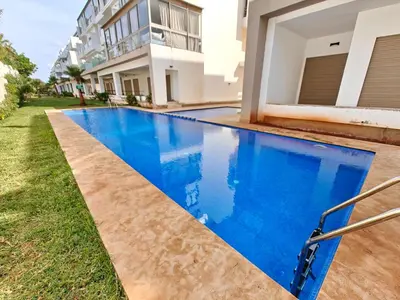 an image of a swimming pool in a house at L'Écume des Sablettes in Mansouria