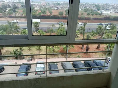 a view from a window of cars parked in a parking lot at Sara Appartement in Casablanca