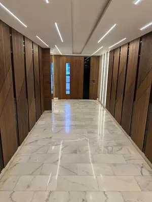 a large room with a marble floor and wooden walls at Harmonie Elitaire in Casablanca