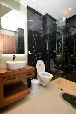 a bathroom with a toilet and a sink and a shower at Antonio Cerezo in Maarif