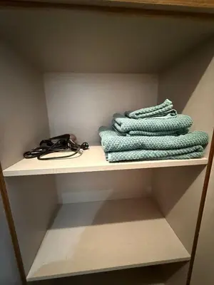a group of towels sitting on a shelf at Adresse exceptionnelle Casablanca in Casablanca