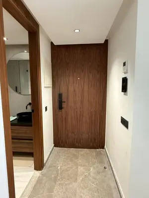 a hallway with a wooden door in a kitchen at Adresse exceptionnelle Casablanca in Casablanca