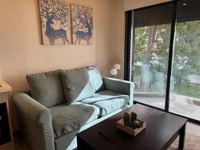 a living room with a couch and a coffee table at Studio en plein centre de Gautier in Casablanca
