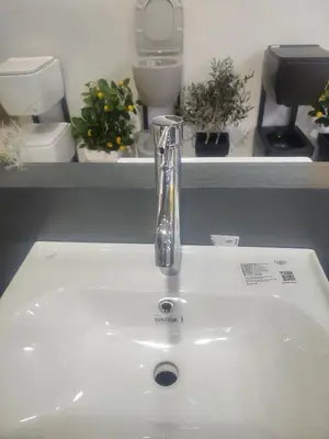 a bathroom sink with a vase on top of it at Cozy & Bright Studio in Casablanca