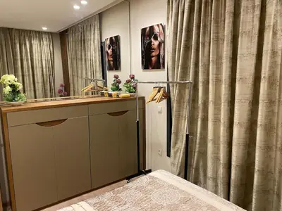 a bathroom with a sink and a shower at Appartement à Gauthier, Casablanca in Casablanca
