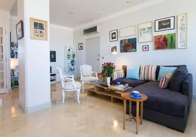 a living room with a couch and a table at Appartement Lilia in Casablanca