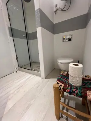 a bathroom with a shower and a toilet at Stay In GAUTHIER studio s in Casablanca