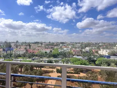 a view of a city from a balcony at Beautiful, Bright and modern 3 bedroom apartment in Casablanca