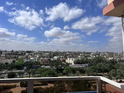 a view of a city from a balcony at Beautiful, Bright and modern 3 bedroom apartment in Casablanca