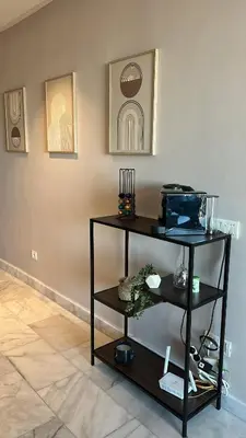 a black shelf in a room with a wall at Le Balcon du Port in Casablanca