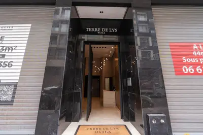 a entrance to a building with a sign on it at Les Princesses studio, self check-in, parking in Casablanca