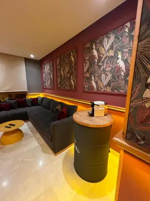 a living room with a couch and a table at Lux immo in Casablanca
