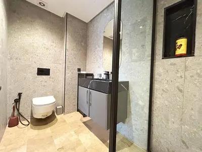 a bathroom with a toilet and a sink in it at 12th Palm Living Modern Studio - Near Maarif in Casablanca