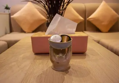 a table with a cup on top of a table at R101-6- Lovely and Spatious apartments in Belvedere near High Speed Train Station in Casablanca