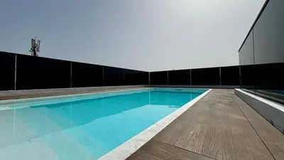 a swimming pool on top of a building at Rooftop Pool Studio - By AppartAli in Casablanca