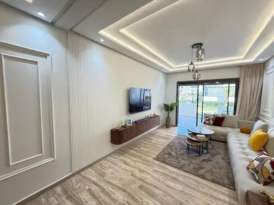 a living room with a couch and a tv at La Casa in Tamaris