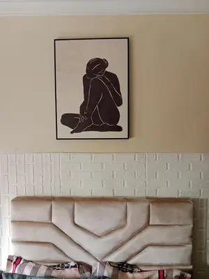 a picture of a person sitting on a couch at La maison de rêve in Casablanca