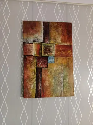 a painting of a cross on a wall at La maison de rêve in Casablanca