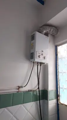a room with a air conditioner on the wall at Dar Indigo in Temara