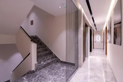 a staircase in a building with a glass wall at Appartement luxueux plein centre Casablanca - 2 Personnes in Casablanca
