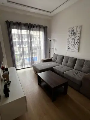a living room with a couch and a coffee table at Évasion de luxe Tamaris in Tamaris