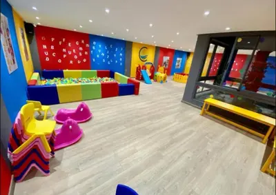 a childrens play room with colorful walls and floors at Évasion de luxe Tamaris in Tamaris