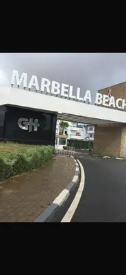 a sign that reads marbella bella beach at Marbella Beach apartement holiday 2 chambres,piscine et plage in Mansouria