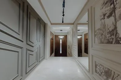 a hallway with white walls and white tile floors at The Shelter Residence by GoodMove - Bourgogne, Casablanca in Casablanca