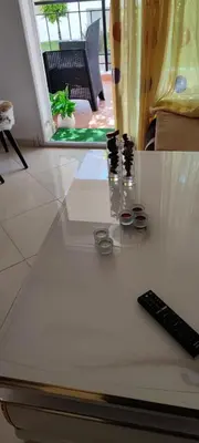 a remote control sitting on top of a table at Al yakoute in Mansouria