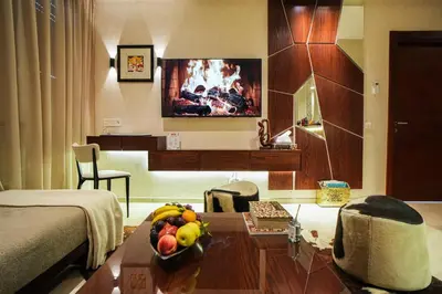 a room with a table with a bowl of fruit on it at Domaine d'Anfa - Luxe & Mer in Casablanca