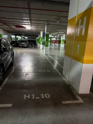 an empty parking garage with cars parked in it at شقة فاخرة - Luxury apartment in Casablanca