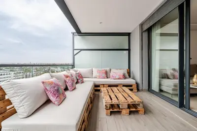 a living room with a white couch and a table at C04 Comfort & Design Studio with Private Terrace CFC in Casablanca